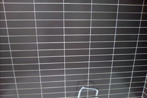 after image of re-grouting around bath to reseal the wet area.
